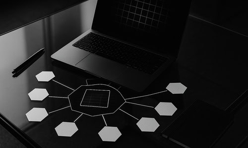 AI Keyword Intelligence Report – Entity Cluster Laptop with radial keyword entity map in monochrome